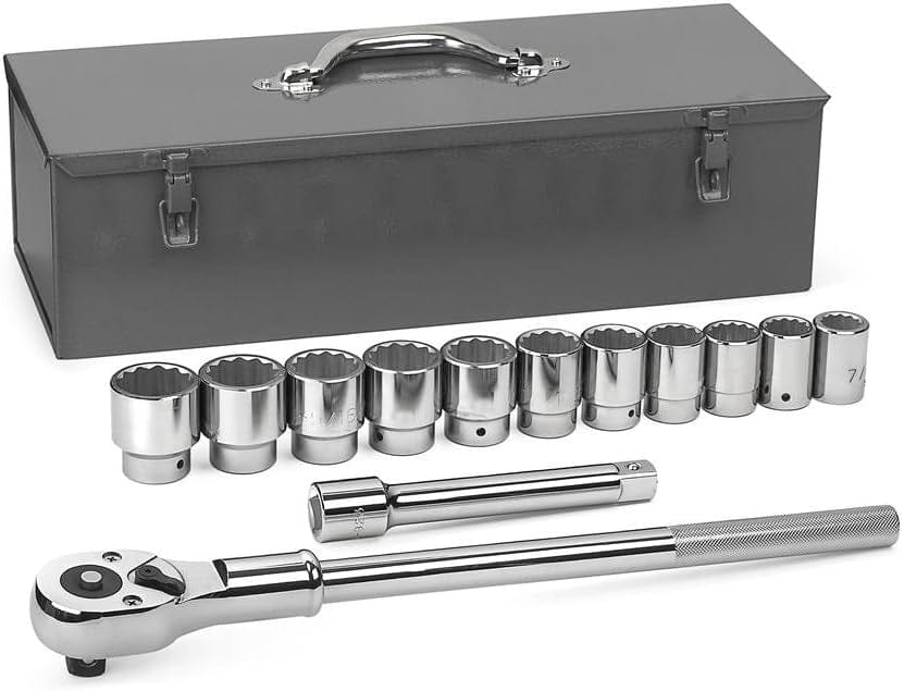 Socket wrench set with ratchet handle, extension bar, and multiple polished sockets displayed in front of a metal toolbox with latches.