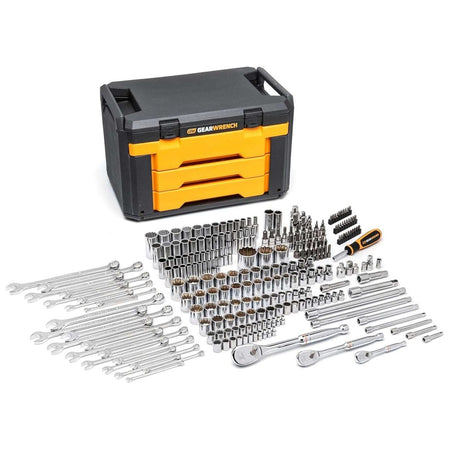 A studio shot of the entire 243-piece GEARWRENCH mechanics tool set laid out in front of its closed 3-drawer black and yellow storage box.