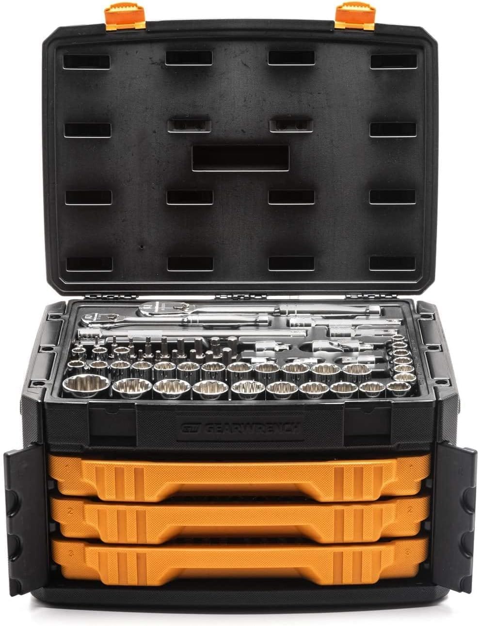 A front-on studio shot of the GEARWRENCH 3-drawer tool box with the top lid open, showing the ratchets and 1/2-inch drive sockets, and the three drawers closed.