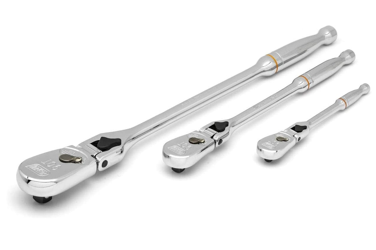 Three chrome GearWrench ratchets of varying lengths arranged side by side, each with directional switches and release buttons, showcasing tool variety for different torque needs.