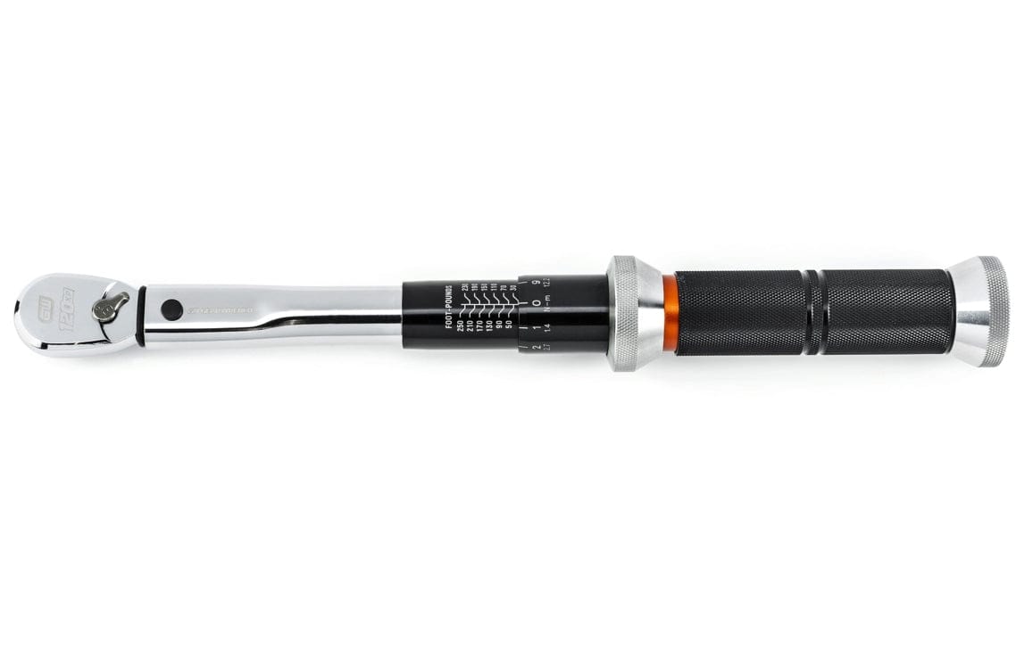 Torque wrench with dual scale in foot-pounds and Newton-meters; markings range from 20 to 120 ft-lb and 27 to 163 Nm.
