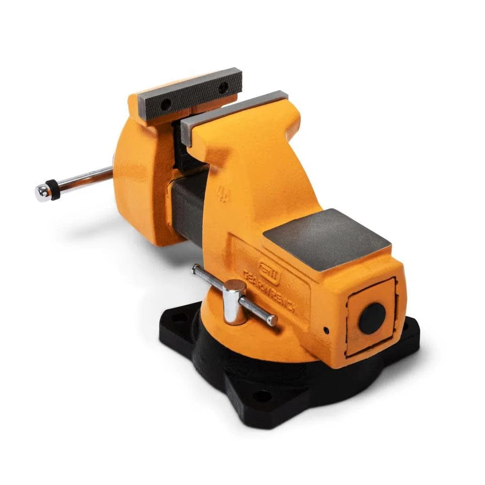 Heavy-duty yellow and black Yost F9WW bench vise mounted on a workbench, featuring a rotating base and textured jaws for gripping materials in mechanical tasks.