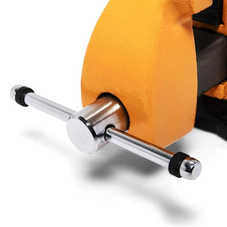 Close-up of a orange bench vise handle with polished metal and black rubber rings, showing the adjustment mechanism used to clamp objects securely.