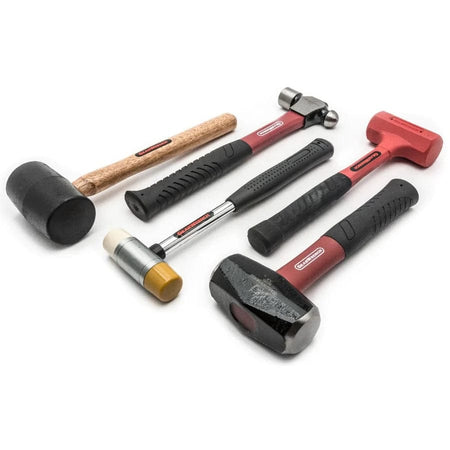 All five hammers in the GearWrench set laid out diagonally on a white background showing the different handle materials and head types.