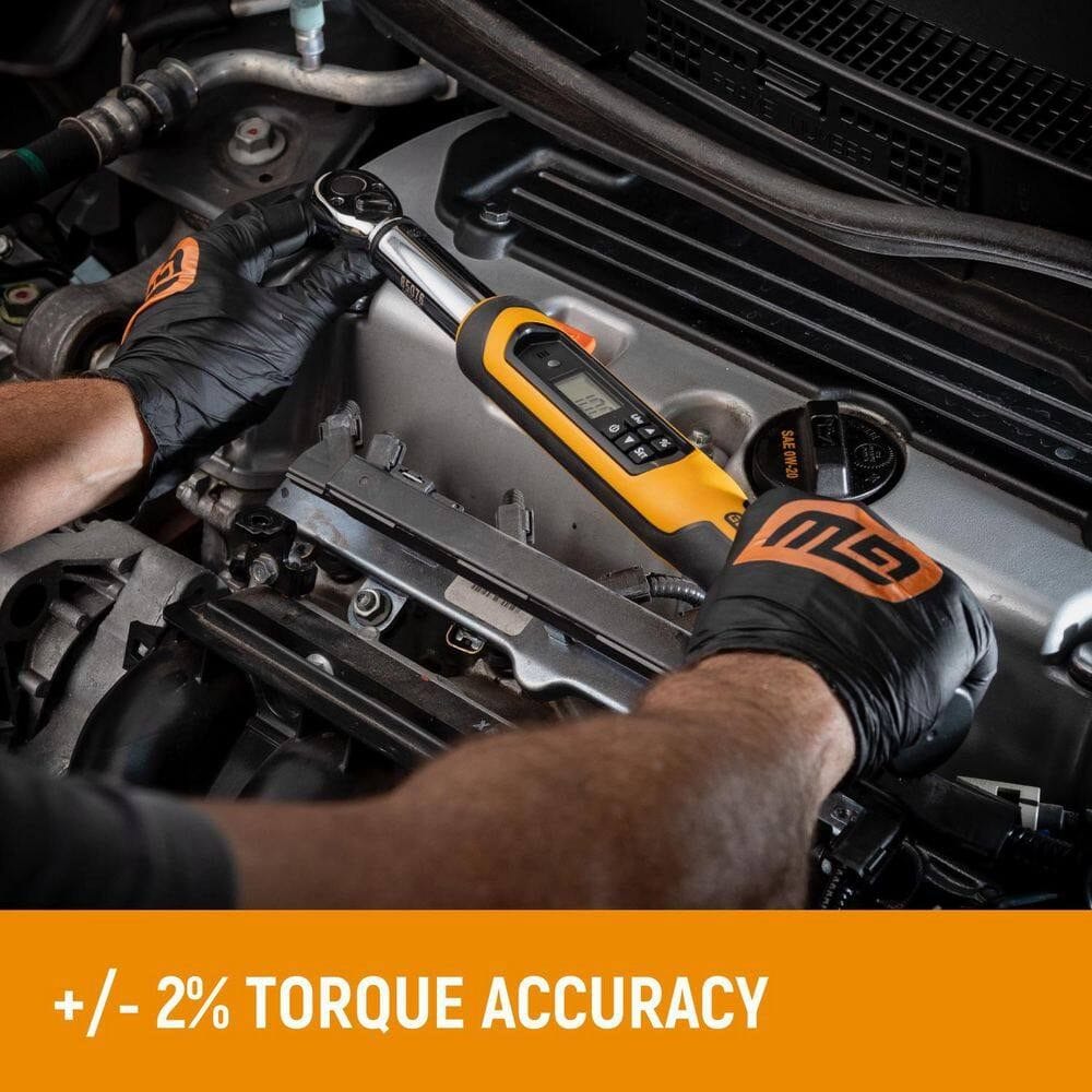 Mechanic using a digital torque wrench on an engine with visible "+/- 2% Torque Accuracy" banner at the bottom.