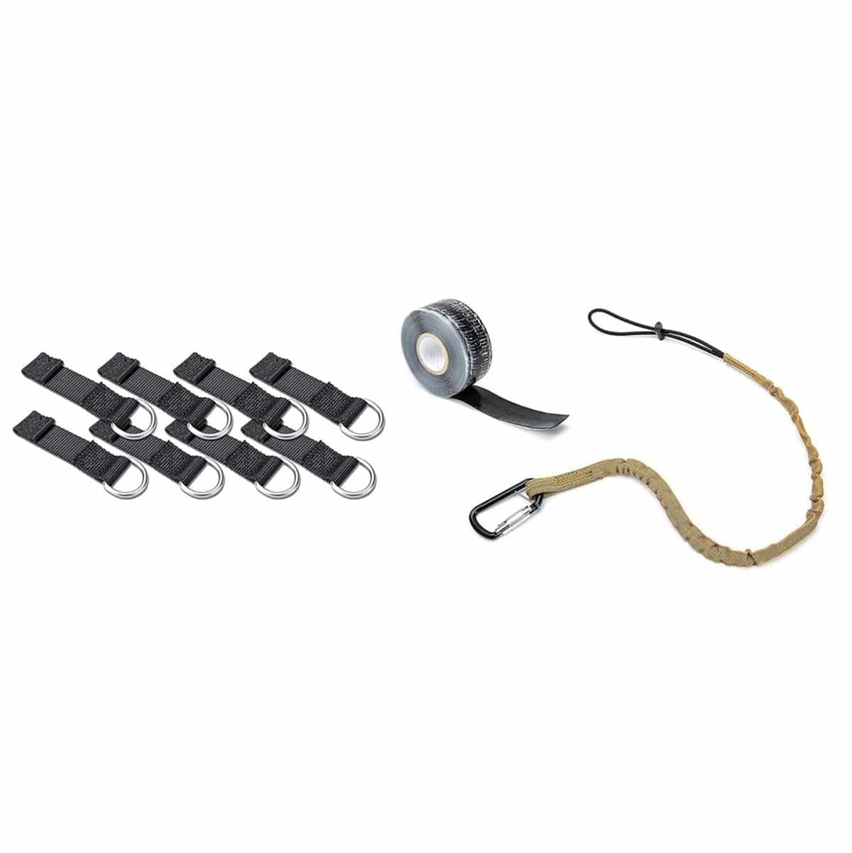Studio view of the complete 10-piece tethering kit displaying eight black D-ring web tethers, one roll of self-sealing tether tape, and one molten orange safety lanyard.