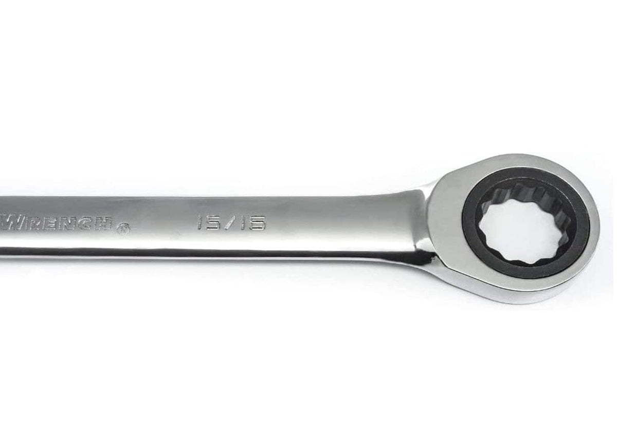 Close-up of the 15/16 inch wrench handle leading to the 12-point ratcheting box end with its black internal gear mechanism.