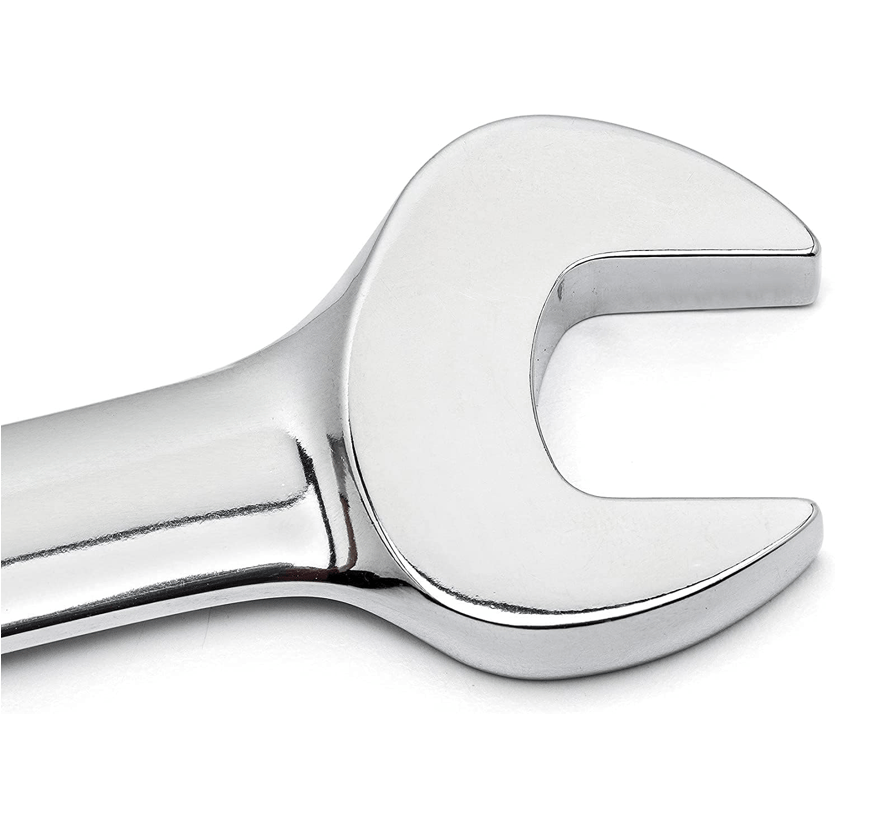 Close-up view of the polished chrome open end jaw of a combination wrench.