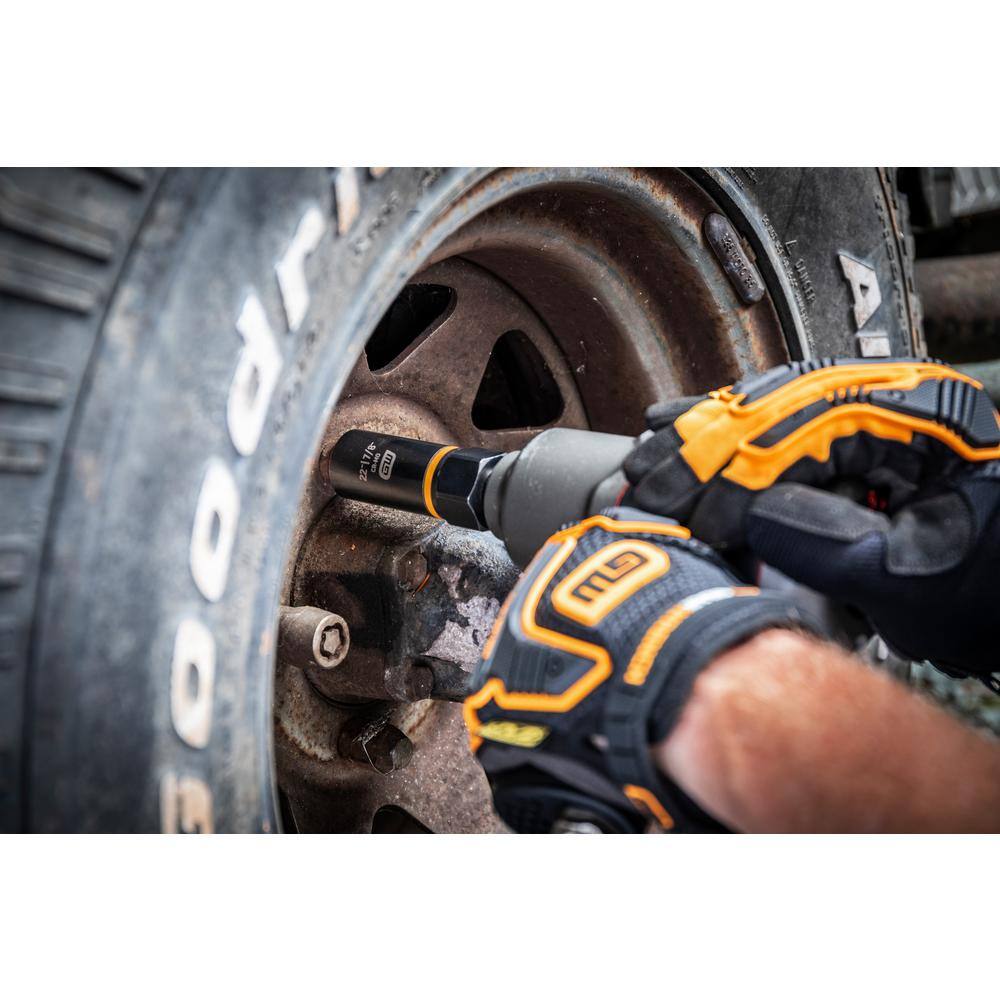 Impact wrench driving a GearWrench deep Bolt Biter extraction socket onto a rusted automotive wheel lug nut.
