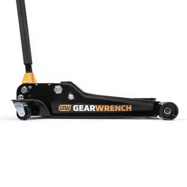 Side view of Gearwrench floor jack with long handle, front roller, and rear caster; branding clearly shown.