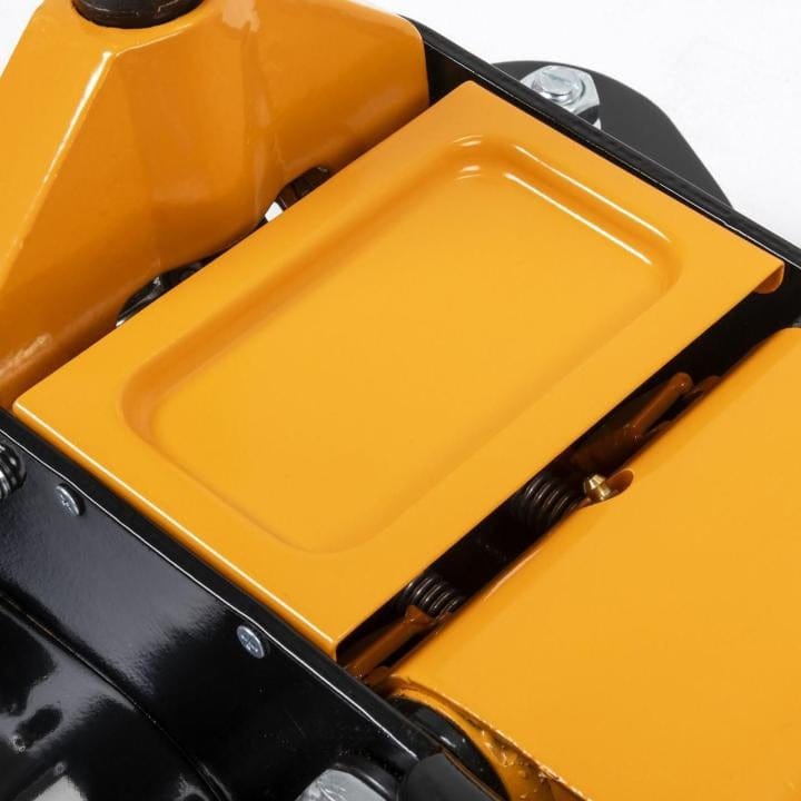 Mechanical detail of Gearwrench jack frame; yellow housing with bolts and springs for hydraulic support.