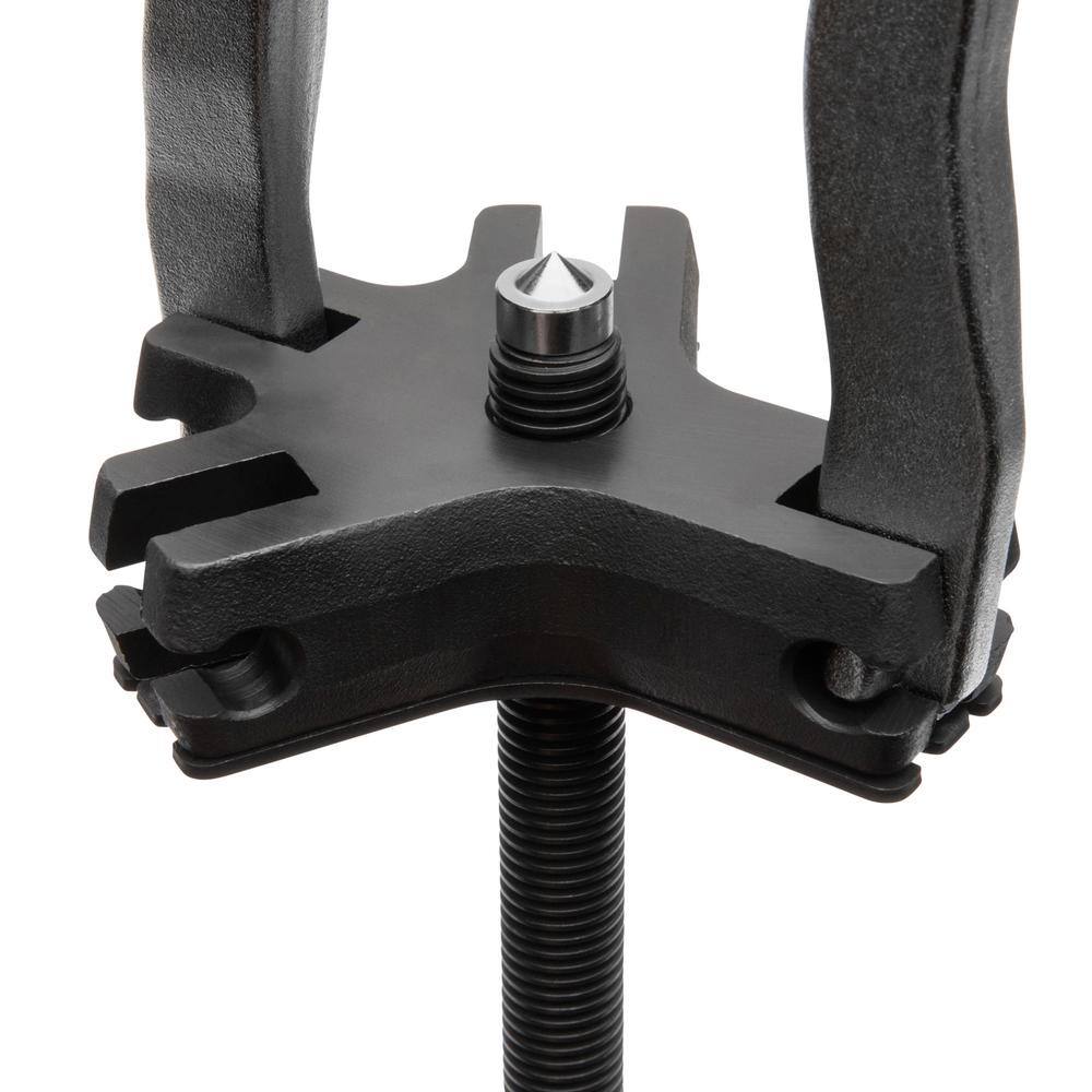 Close-up detail of the Gearwrench ratcheting puller indexing head and center drive screw, highlighting the precision-engineered threads and the locking mechanism that keeps legs securely in place during operation.