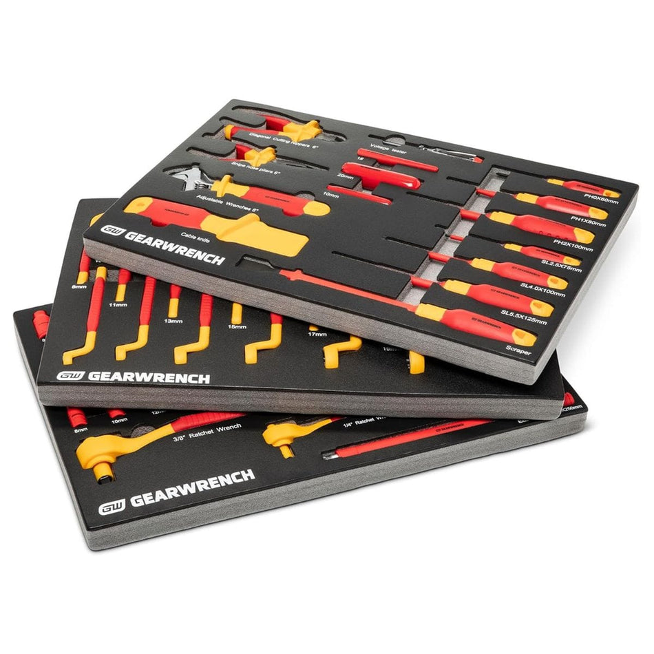 Three custom-fitted high-density black foam organizer trays stacked together, showcasing the comprehensive layout of the Gearwrench 72-piece VDE insulated mechanics tool set with its red and yellow 1,000V protective coatings.