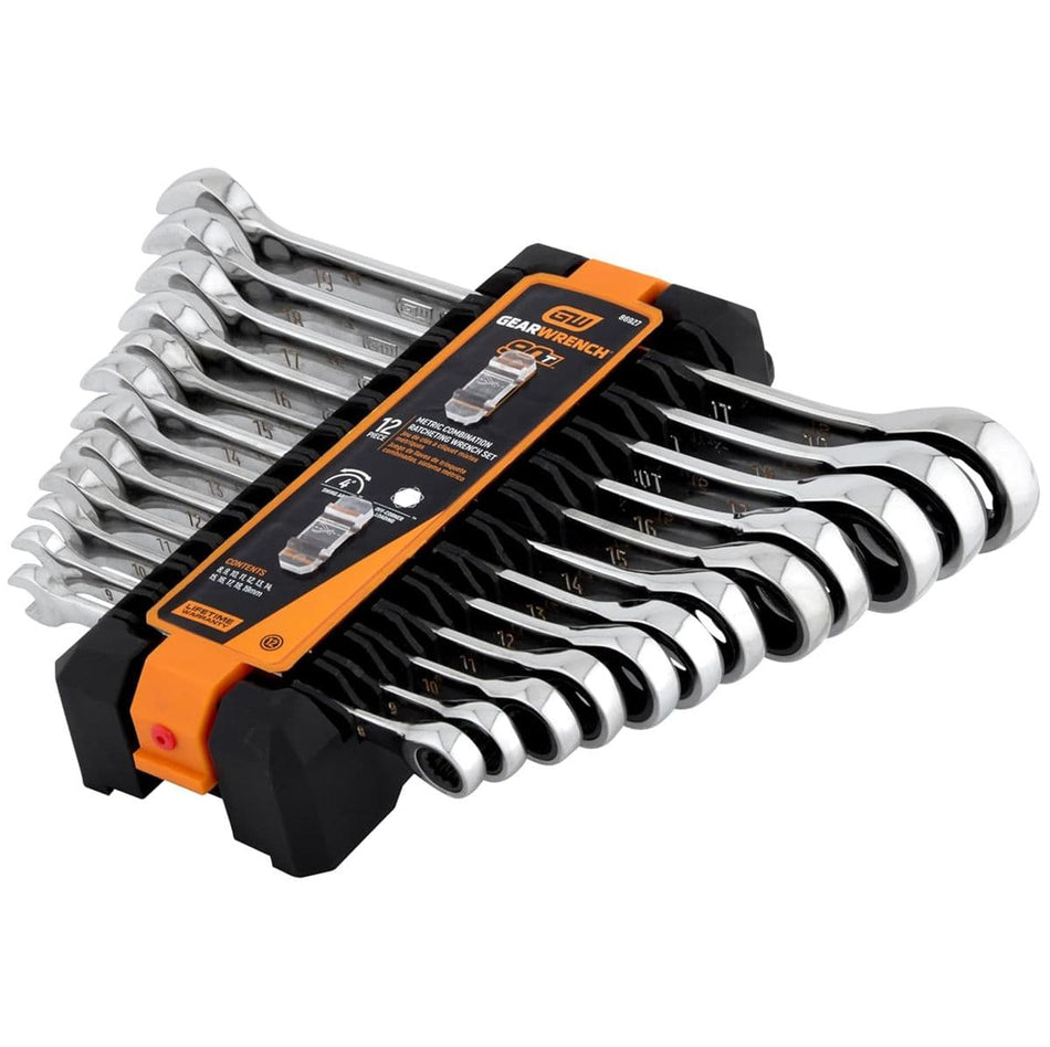 An angled studio view of the Gearwrench 86927 12-piece metric ratcheting combination wrench set stored inside its black and orange compression rack, displaying the layered arrangement from 8mm up to 19mm with full-polish chrome finishes.