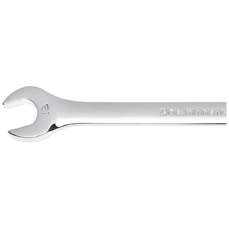 An isolated close-up macro shot of the smooth open-end configuration on a polished alloy steel combination wrench, displaying a distinct 15mm size stamp.