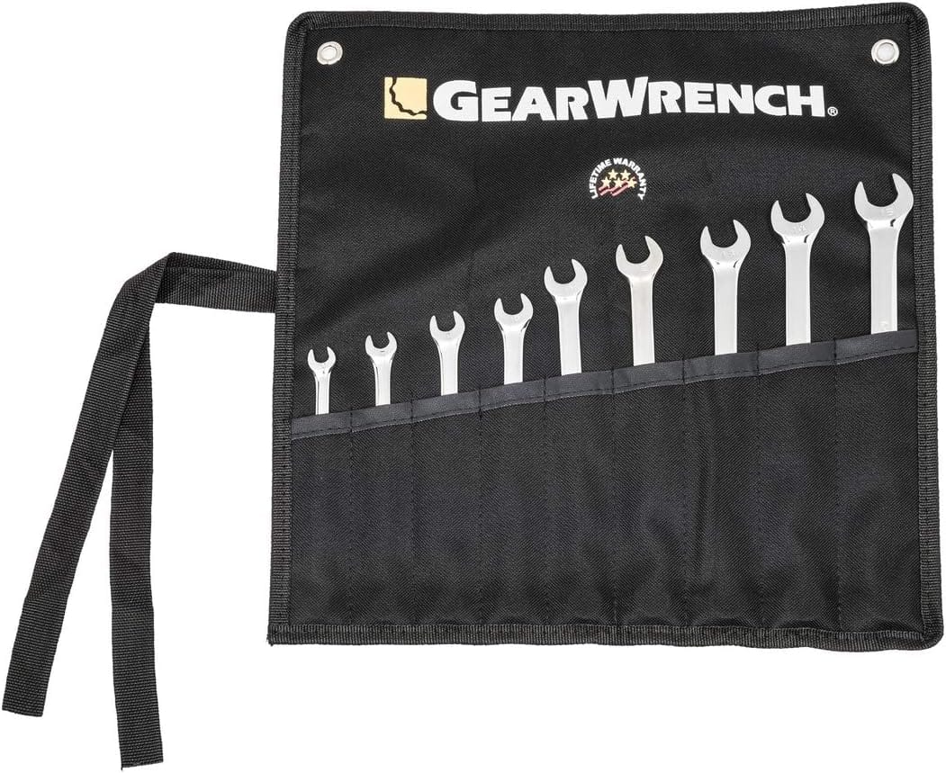 An overhead shot of the black canvas tool storage roll laid flat, showing how the staggered tool pockets hold the nine metric wrenches securely for transit.