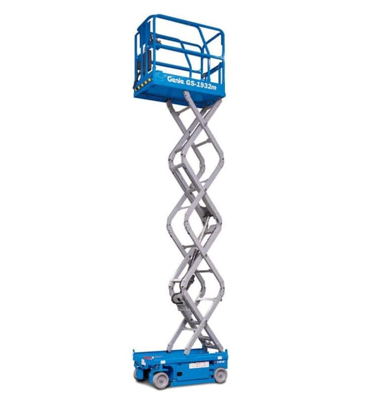 Genie GS-1932M scissor lift shown in extended position with crisscrossing metal arms and guardrail platform. The electric-powered lift is designed for safe elevation in industrial or construction settings, with the model name clearly visible on the side.