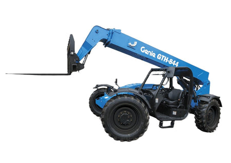 Genie GTH-844 telehandler positioned for high-reach lifting, featuring telescopic boom, fork attachment, rugged tires, and enclosed operator cabin; designed for heavy-duty material handling in industrial and construction settings.
