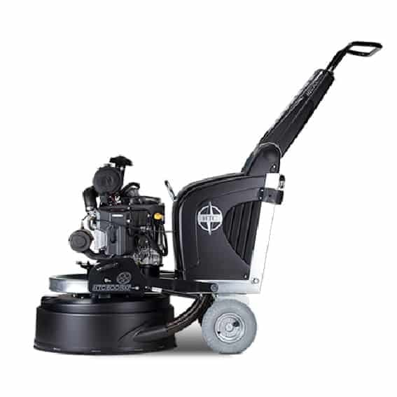 Side profile view of the HTC 800 RXP propane floor grinder showing the exposed engine, black chassis with HTC logo, and floating grinding cover.