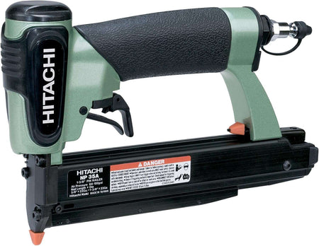 A three-quarter angle studio shot of the green and black Hitachi NP35A 23-gauge pin nailer, showing the specification label on the magazine.