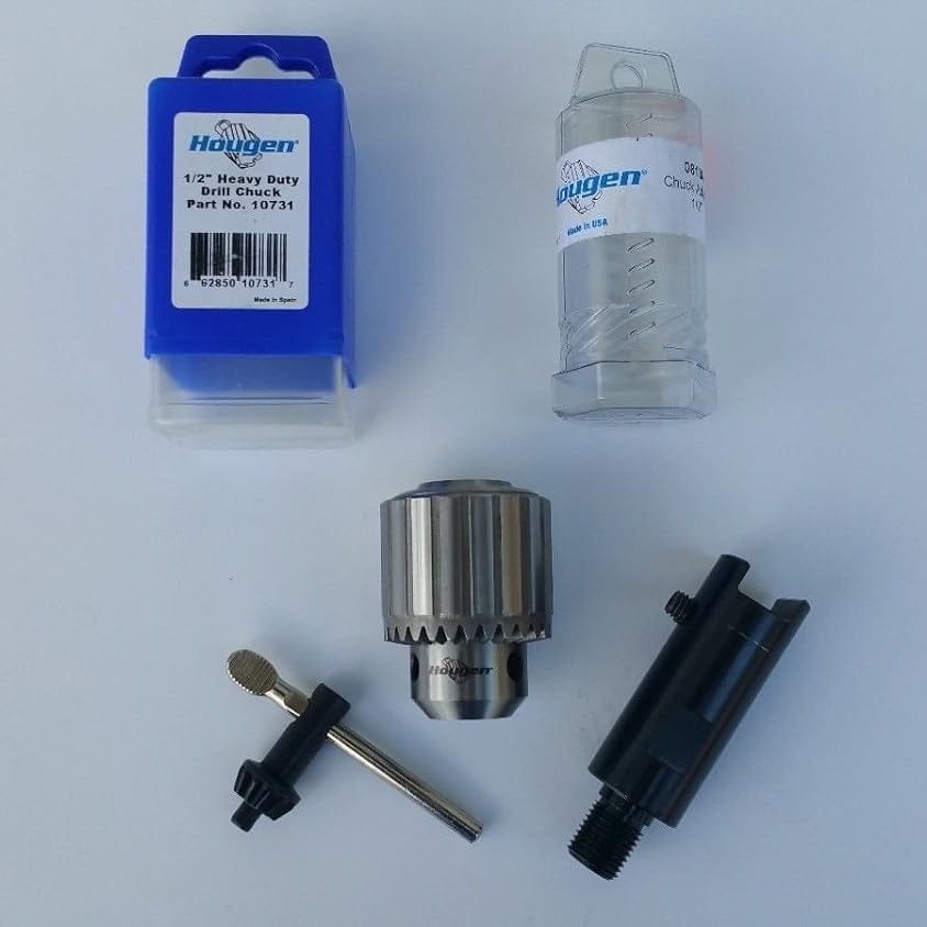 The image displays a disassembled drill chuck set on a light gray surface, including a silver chuck with the "Hougen" logo, a chuck key, and two packaging containers. One container is blue and labeled "1/2" Heavy Duty Drill Chuck," while the other is clear and cylindrical.