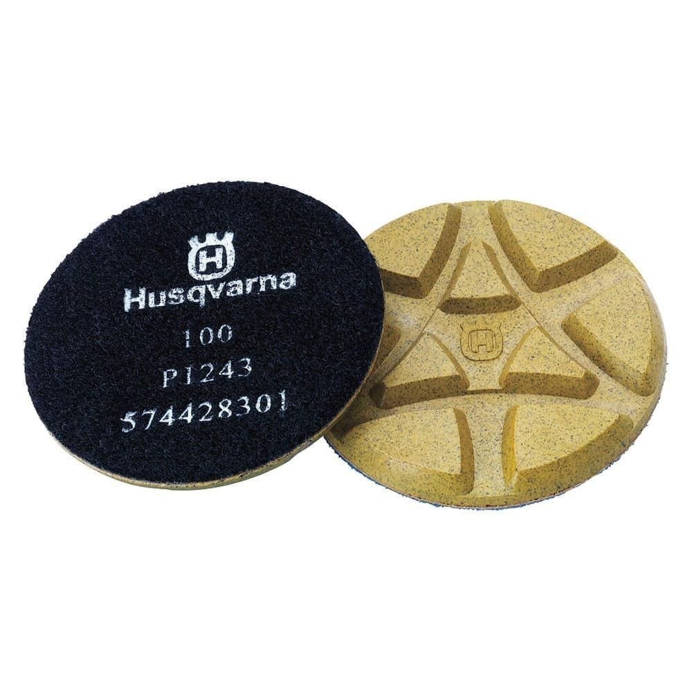 Husqvarna 3" resin polishing pads shown front and back; tan abrasive surface with segmented design and black backing labeled “100 P1243 574428301”.