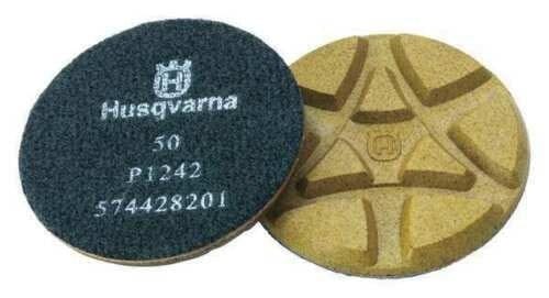 Two Husqvarna 3" resin diamond polishing pads shown front and back; segmented abrasive surface and black backing labeled “50 P1242 574428201”.