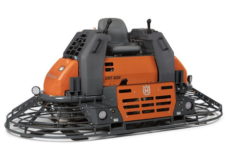 Husqvarna CRT 60X ride-on concrete trowel with operator seat, dual levers, and protective blade cages.