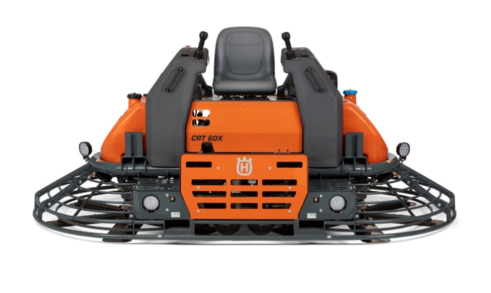 Husqvarna CRT 60X ride-on trowel with dual rotors, joystick controls, and branded orange panel for slab smoothing.