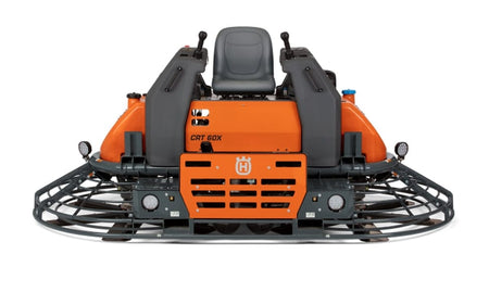 Husqvarna CRT 60X ride-on trowel with dual rotors, joystick controls, and branded orange panel for slab smoothing.