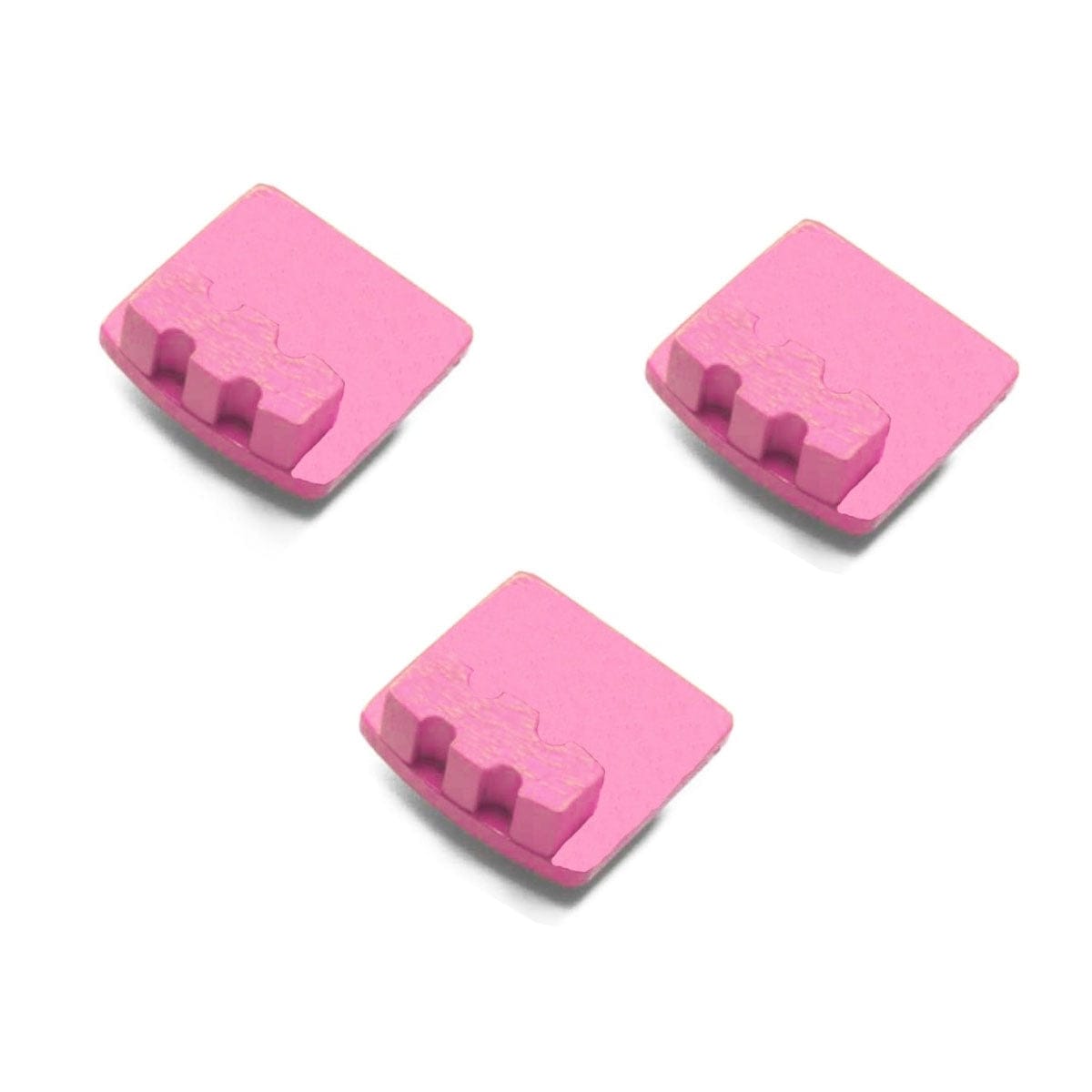 Three pink Husqvarna medium bond diamond grinding segments with raised terrain-like ridges; designed for epoxy, glue, and concrete removal.
