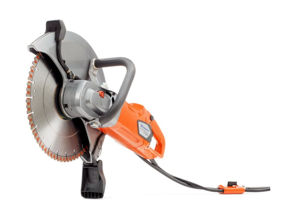 Handheld electric cut-off saw with segmented blade and orange-gray body designed for cutting concrete and metal.