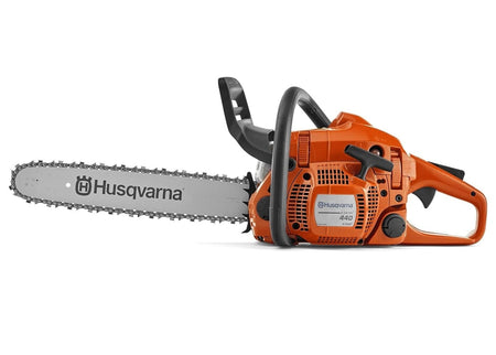 Side view of Husqvarna 440 gas chainsaw showing orange and black body, metal cutting bar, front hand guard, rear handle, and visible air filter cover with model number and branding.