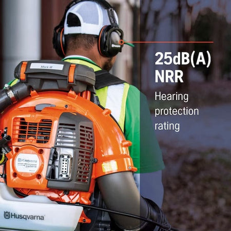 An action photo of a worker wearing Husqvarna Professional Headband Hearing Protectors while using a backpack leaf blower, with text indicating a 25dB(A) NRR hearing protection rating.