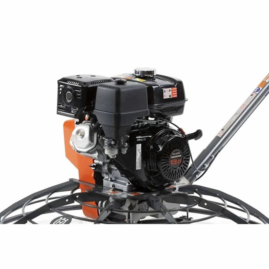 Close-up shot of the 11.7 HP Honda GX390 engine mounted on the Husqvarna CT 48 power trowel, showcasing the industrial-grade components and the gyroscopic safety stop technology.