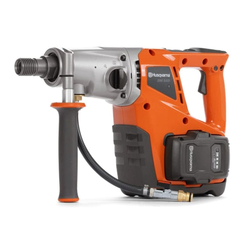 A studio product photograph of the Husqvarna DM 540i Battery Powered Core Drill Motor showcasing its ergonomic orange design, silver gearbox, and cordless battery operation for professional wet and dry coring.