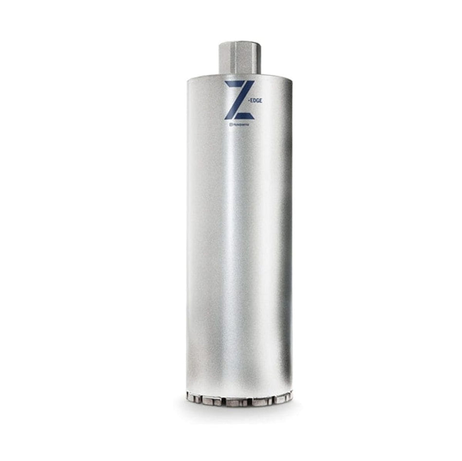 A professional studio photograph of the Husqvarna Elite-Drill B1410 diamond core bit, featuring a 1-3/8-inch diameter silver thin-wall tube with a blue Z-Edge logo and specialized diamond segments at the cutting edge.