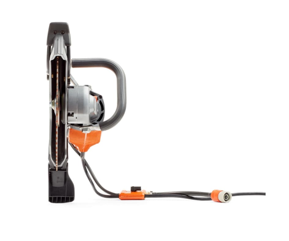Front view of the Husqvarna K4000 electric power cutter, highlighting the position of the 14-inch diamond blade, blade guard, and the cord connection.
