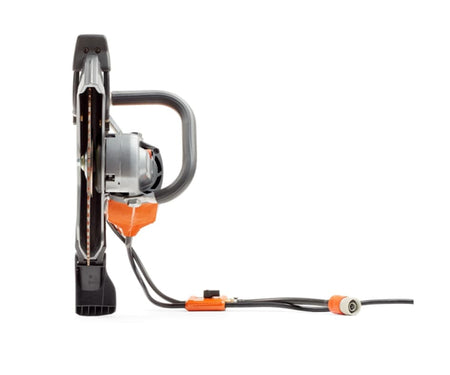 Front view of the Husqvarna K4000 electric power cutter, highlighting the position of the 14-inch diamond blade, blade guard, and the cord connection.