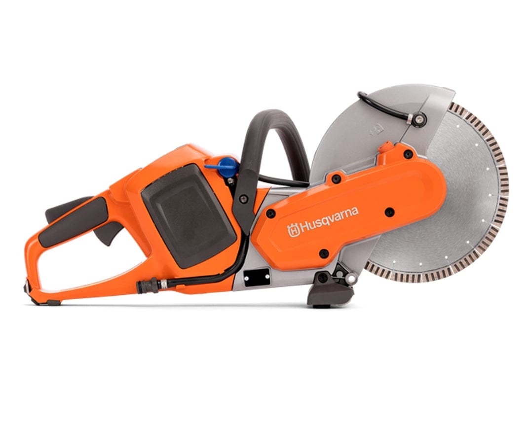 Side view of the Husqvarna K535i cordless cut-off saw (bare tool) with a diamond blade. The saw is orange and gray, showing the trigger handle, front handle, and water connection port.