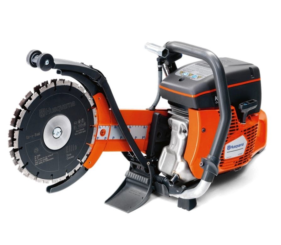 An angled side-view of the Husqvarna K760 Cut-n-Break II showing the internal engine components and the twin diamond blade cutting system.