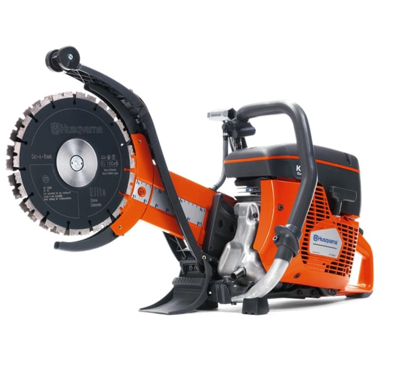 An angled side-view studio photograph of the Husqvarna K760 Cut-n-Break II showcasing the twin-blade system and the robust handle for stable operation.