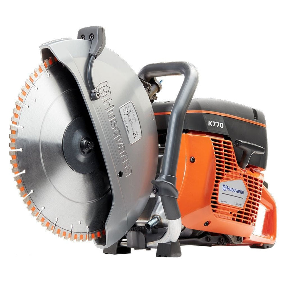 A studio shot of the Husqvarna K770 gas power cutter, featuring a large silver blade guard, an orange engine housing, and a black and gray handle assembly.