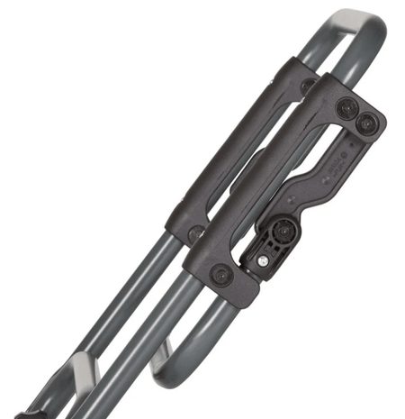 Close-up of a telescoping suitcase handle mechanism with dual metal rods and a plastic grip housing.