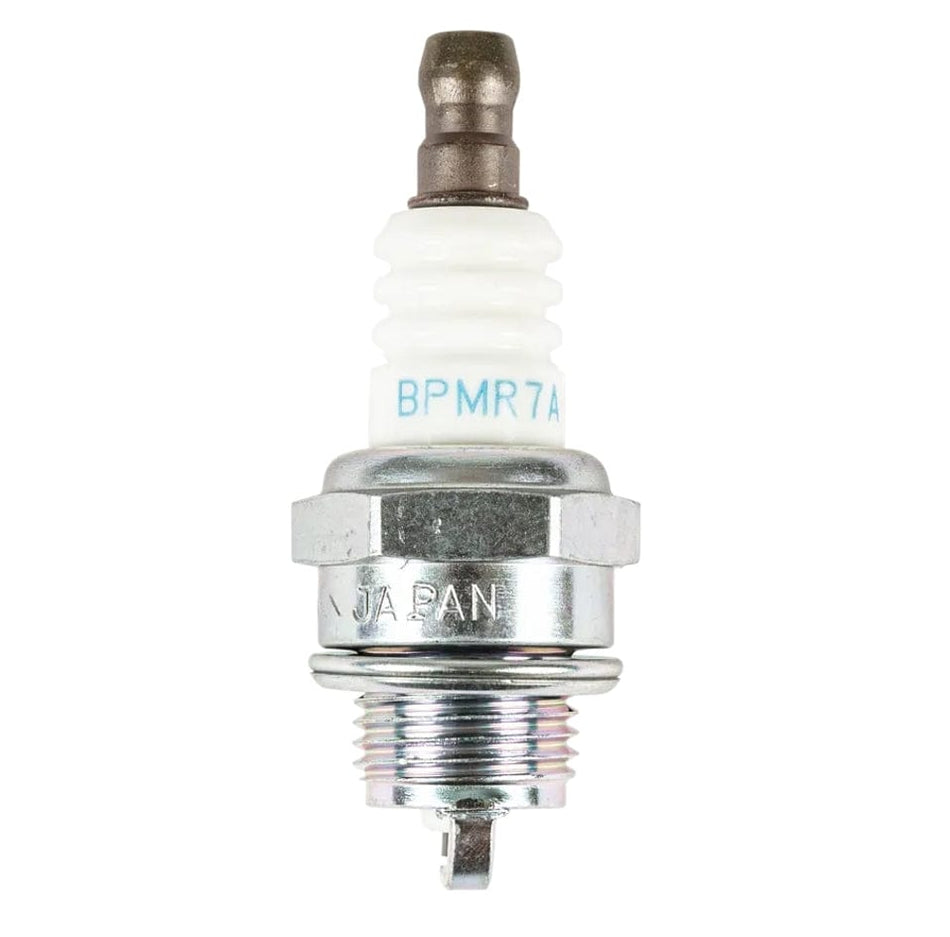 A high-resolution studio shot of a Husqvarna OEM spark plug featuring a white ribbed ceramic insulator, a metal hex nut base stamped with JAPAN, and a threaded electrode end for reliable engine ignition.