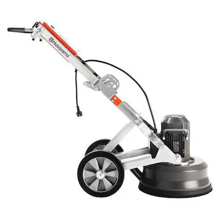 Side profile of the Husqvarna PG 450 single-phase floor grinder, highlighting the ergonomic handlebar tilt and the compact, foldable chassis designed for easy transport and coating removal.