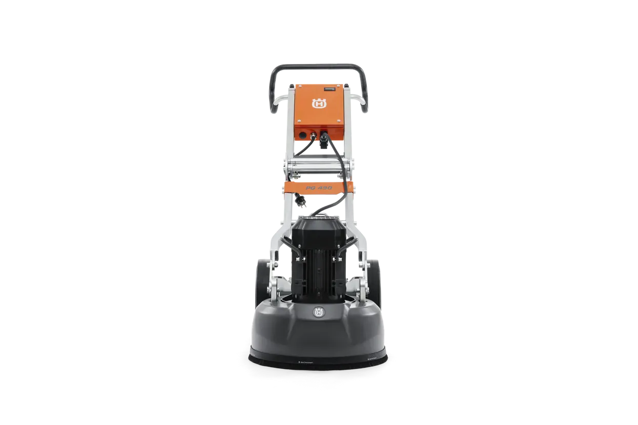 Front-facing view of the Husqvarna PG 450 planetary grinder, emphasizing the centralized motor housing and the orange control box designed for user-friendly operation in domestic floor repair.