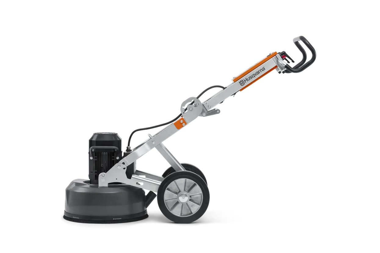 Full side view of the Husqvarna PG 450 concrete polisher in a neutral position, displaying the balance between the heavy-duty grinding head and the maneuverable wheeled frame.