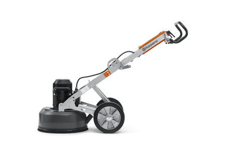 Full side view of the Husqvarna PG 450 concrete polisher in a neutral position, displaying the balance between the heavy-duty grinding head and the maneuverable wheeled frame.