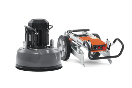 The Husqvarna PG 450 divided into two parts for transport, illustrating how the machine easily separates without tools to fit into standard vehicles for rental and professional use.